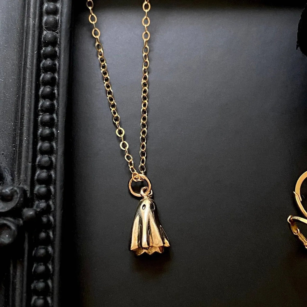 Ghost design pendant necklace on a twisted stainless steel chain with titanium steel pendant.