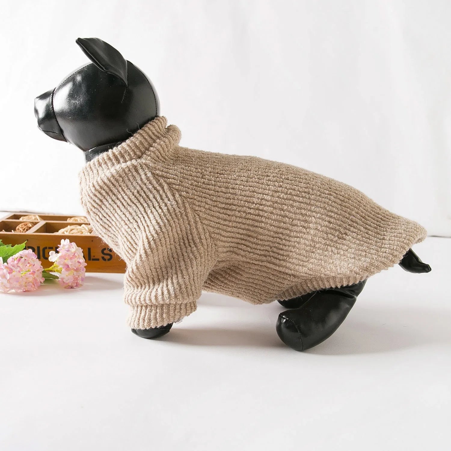 Brown knitted cloth sweater pullover on a small dog, showing casual style.