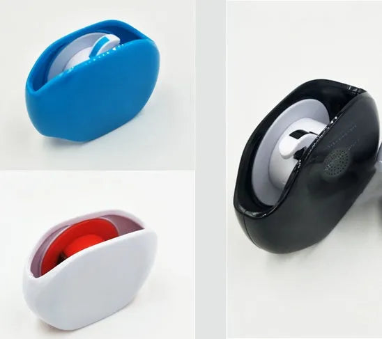 Compact automatic earphone winder in multiple colours on a grey background, showing extended cable.