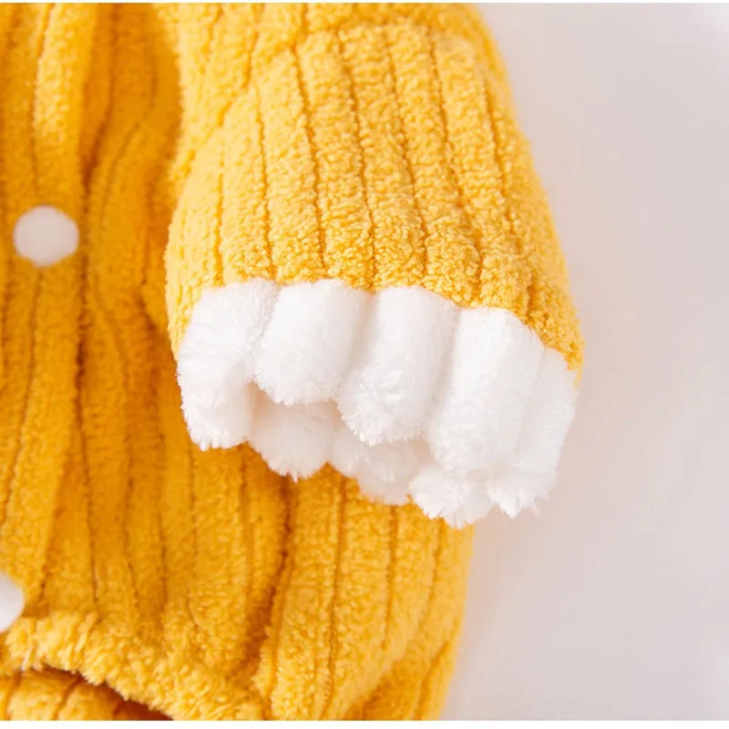 Yellow ribbed fleece pet jumpsuit with white ruffled cuffs and leash ring for cats and small dogs.