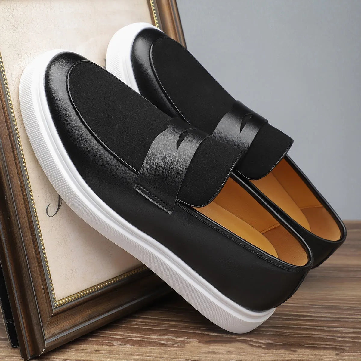 Men's black slip-on casual shoes with tassel detailing, artificial PU upper and rubber sole