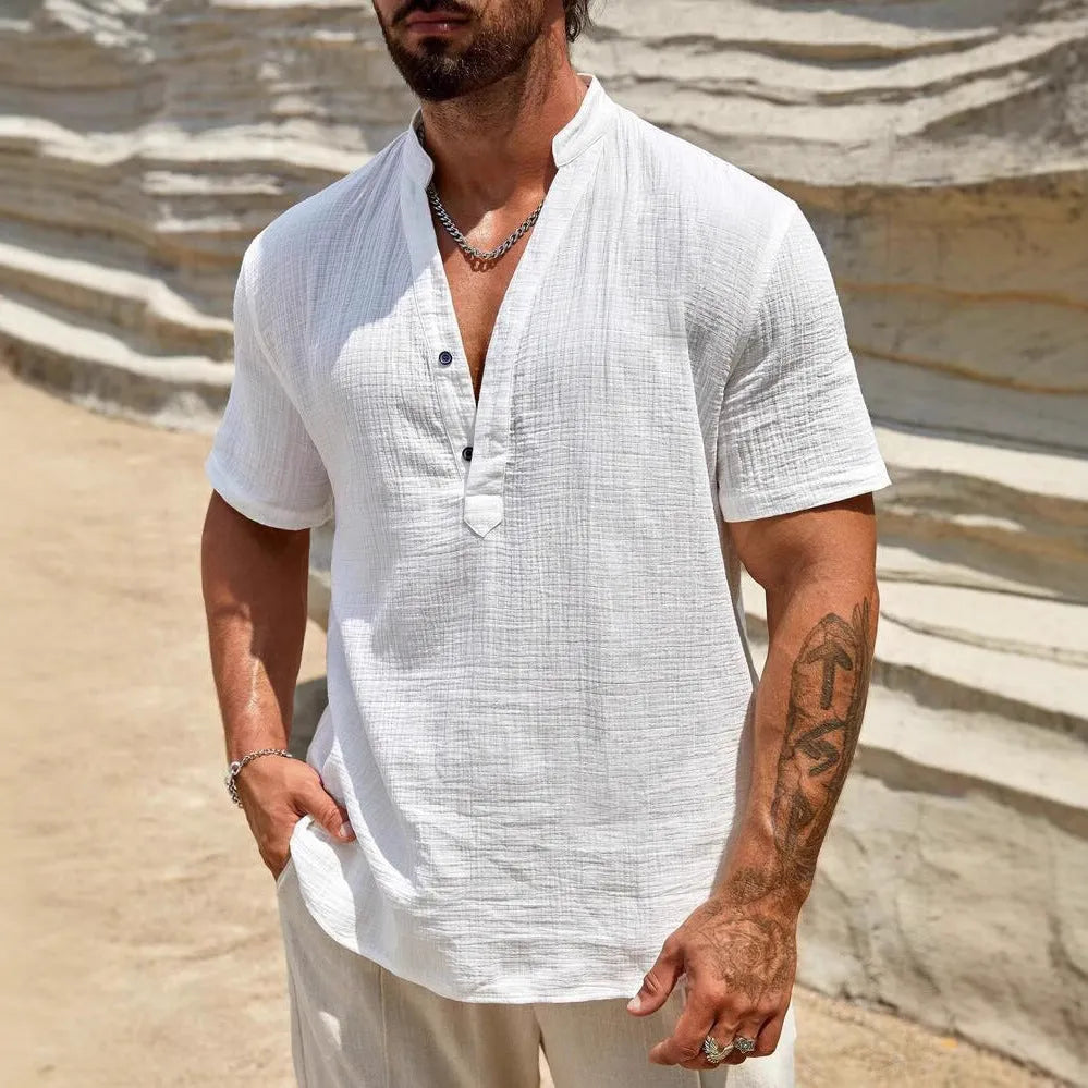 Men's solid colour short-sleeved shirt with a stand collar, shown in a casual style.