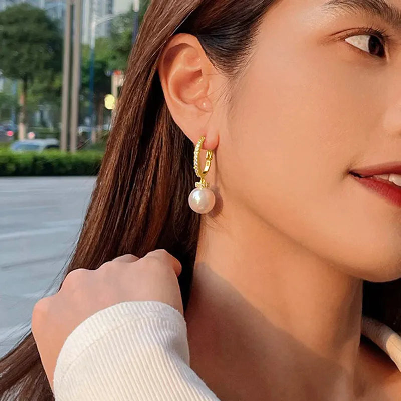 Yellow gold copper earrings with imitation pearl and zircon inlay geometric round ring style
