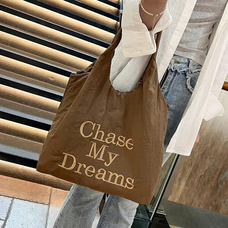 Korean-style 3D Letter shoulder bag with minimalist embroidery in nylon, available in four colours