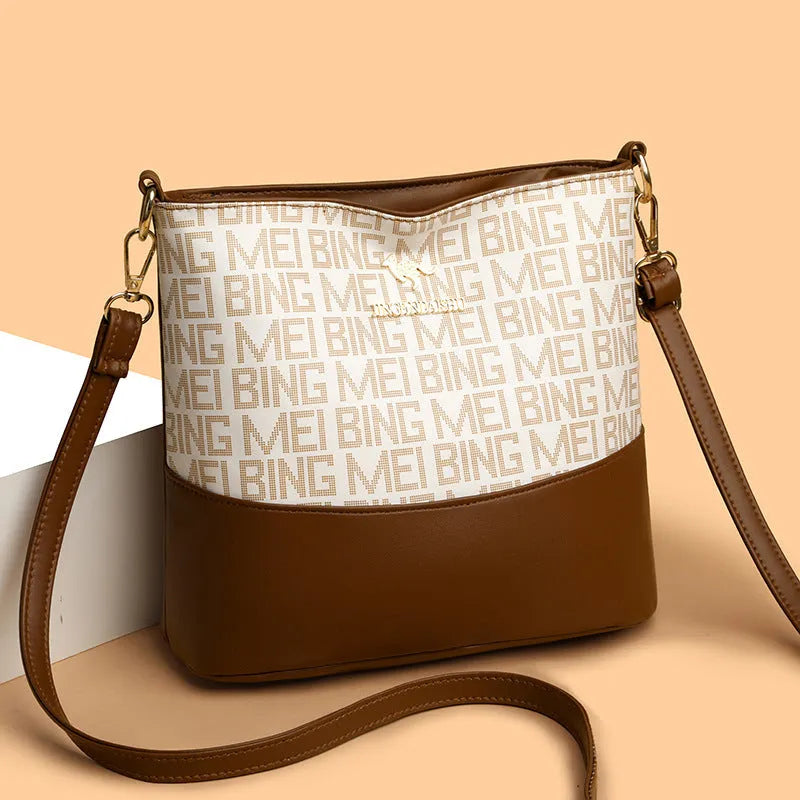 Retro brown soft leather messenger bag with organised compartments and three-dimensional external pocket