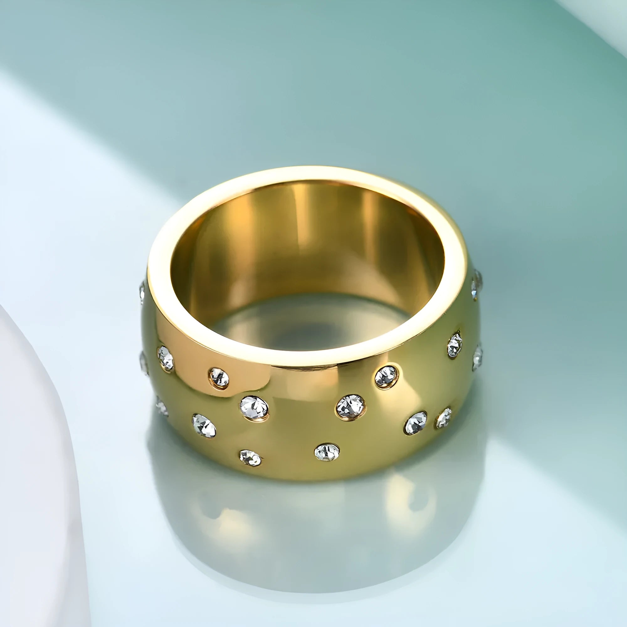 Titanium steel women's couple ring with diamond treatment in geometric design