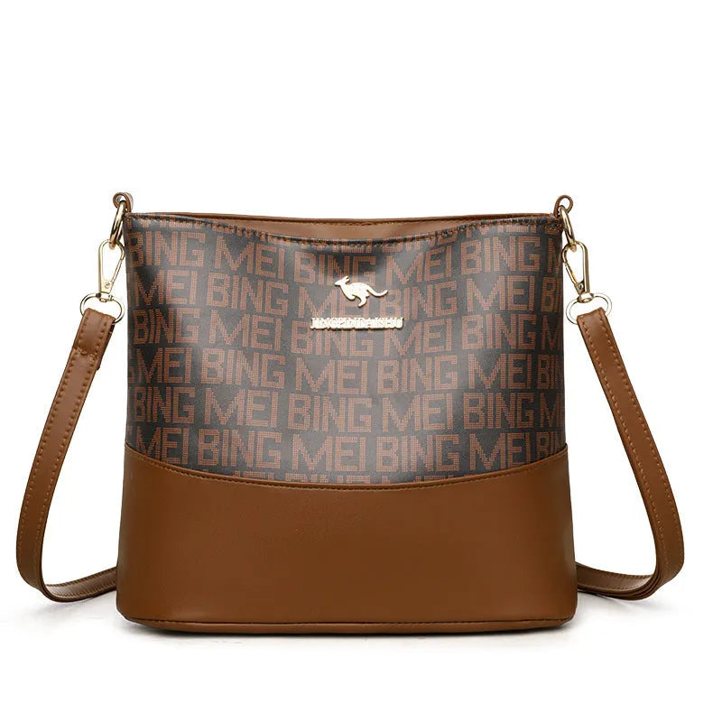 Retro brown soft leather messenger bag with organised compartments and three-dimensional external pocket