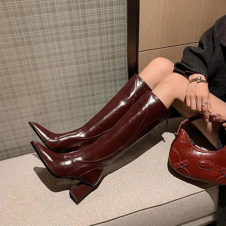 Women's brown retro cowhide high heel riding boots with a waterproof platform sole