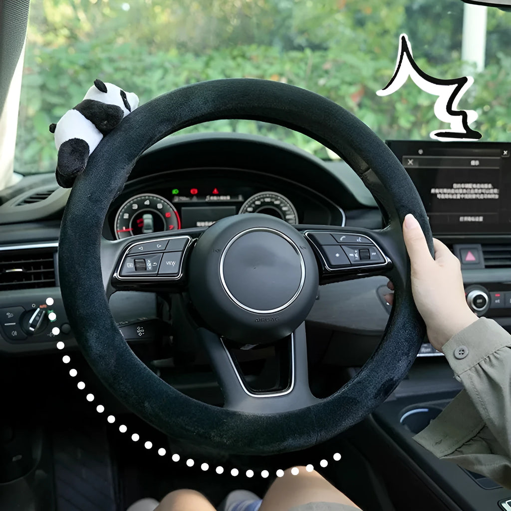 Plush black panda design steering wheel cover and matching shoulder pad set for cars.