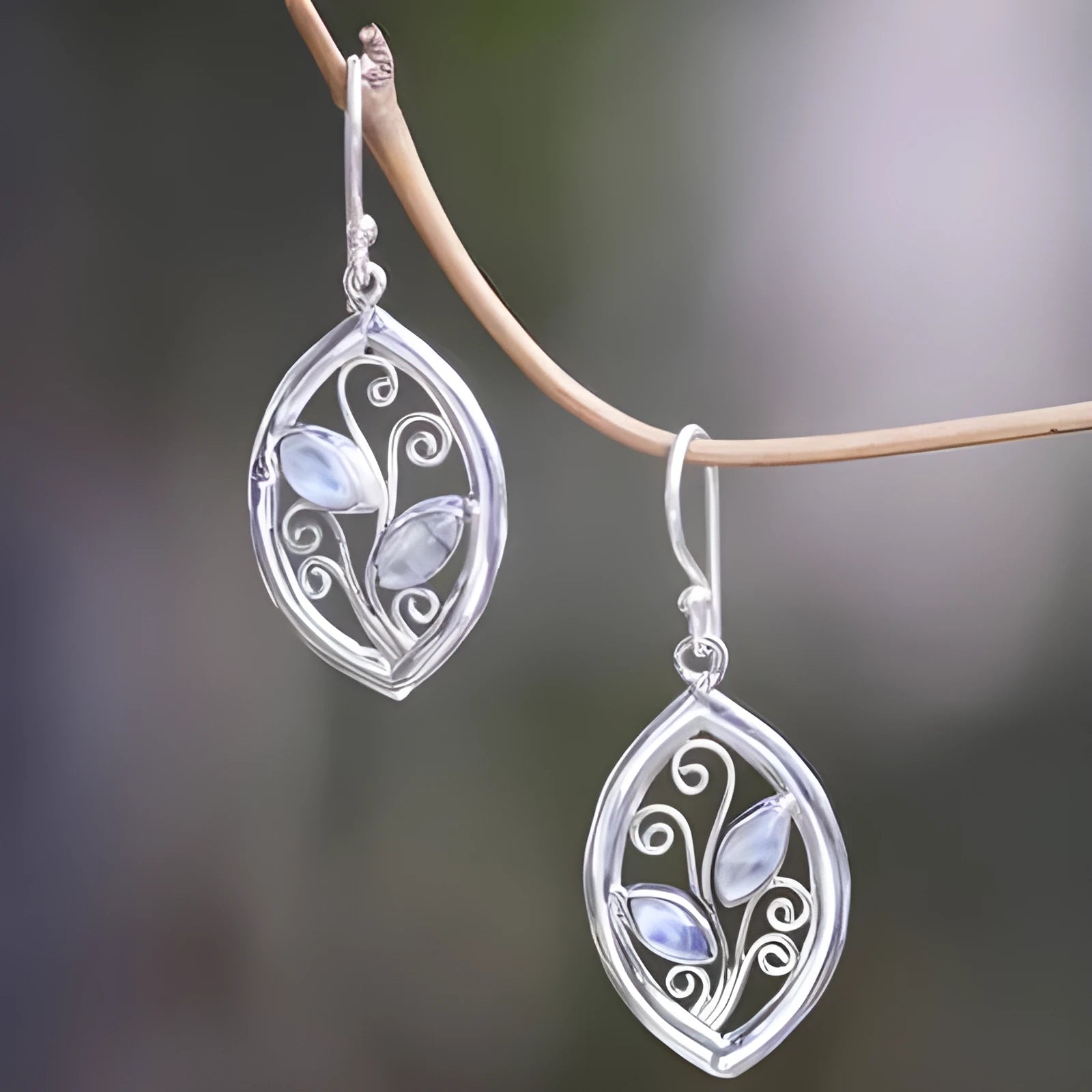 Silver leaf-shaped earrings with colourful moonstone elements for women