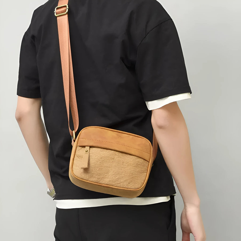 Men's waterproof paper crossbody bag in retro style showing black, brown and silver colour options