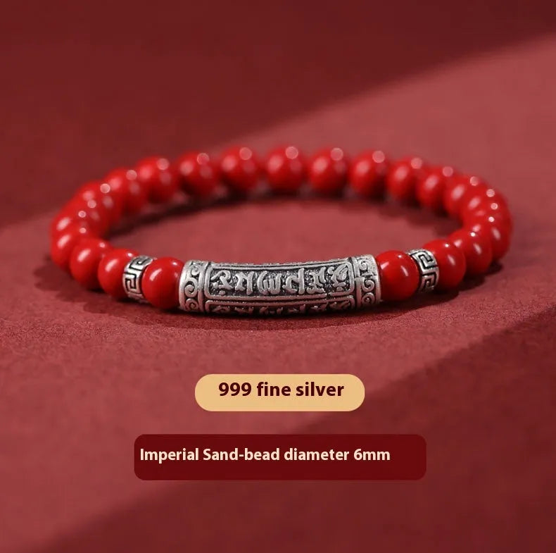 Handmade cinnabar bracelet with purple gold sand beads in a unisex national style design.