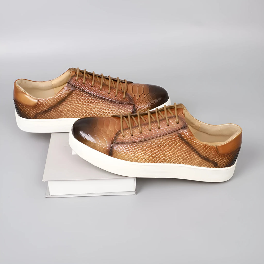 Men's lace-up embossed flat casual leather shoes in brick red with round toe and rubber sole