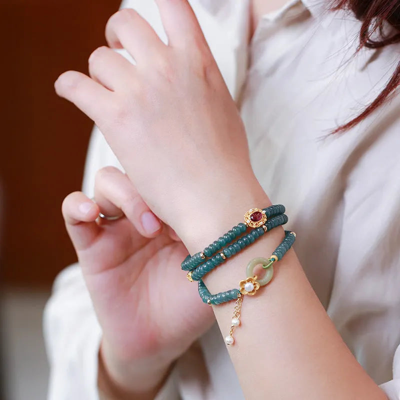 Blue water jade abacus bead and tourmaline ring bracelet with pearls under 4mm.