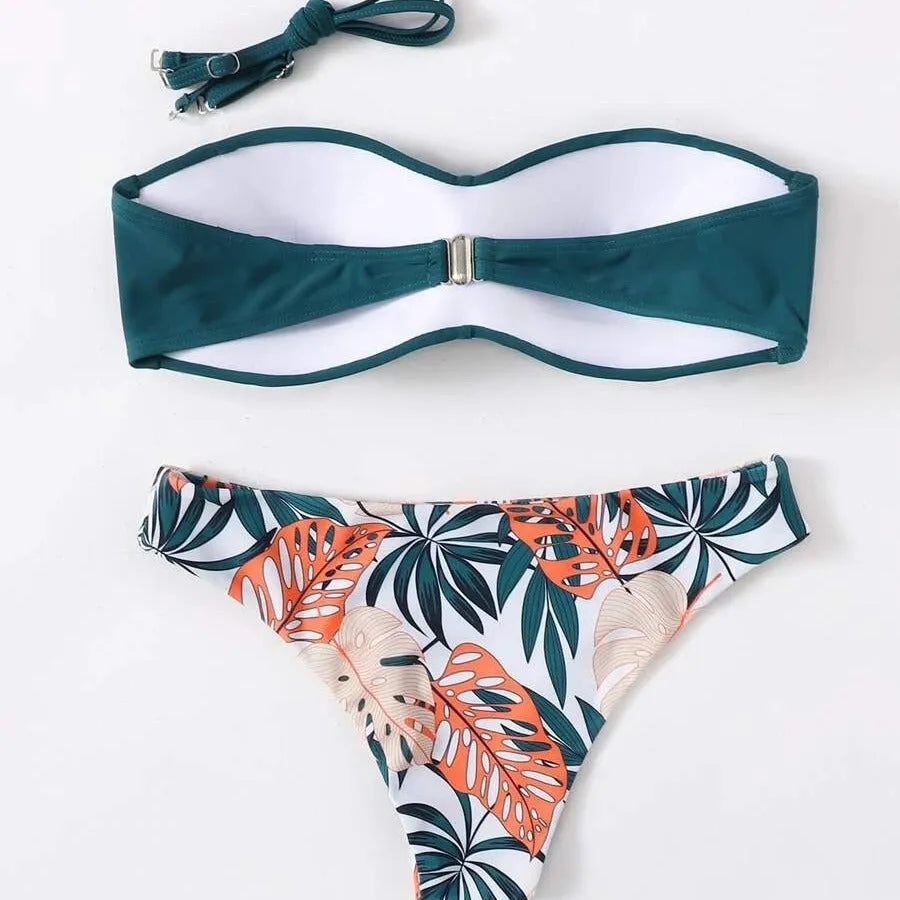 Green hard cup push up bikini swimsuit set with briefs bottom on a mannequin.