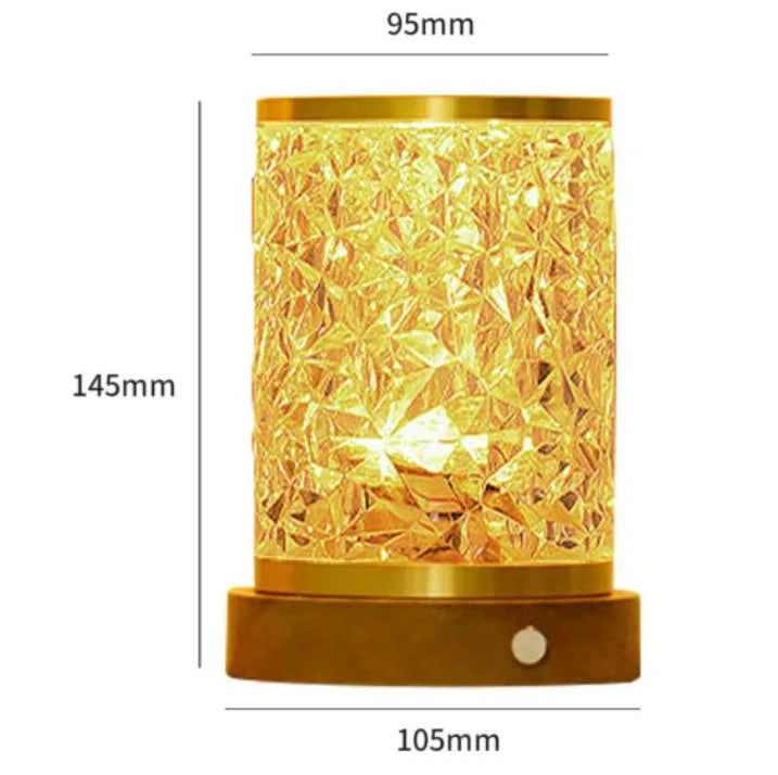 Rotating water ripple effect night light with acrylic dome on a solid wood base.