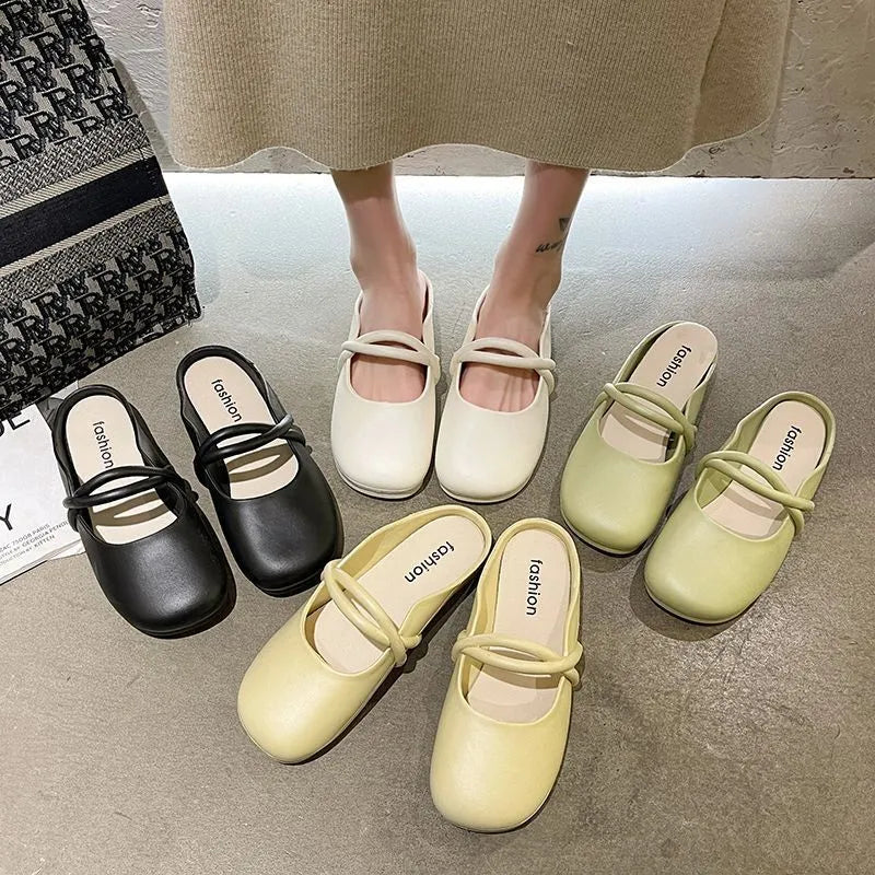 Women's black plastic flip flop sandals with enclosed Baotou front, shown on a white background.