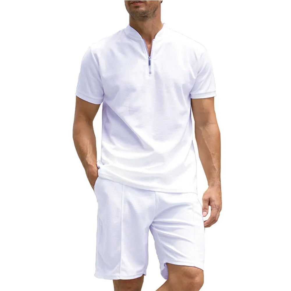 Men's solid colour polo shirt and trouser two-piece suit set in beaded bird's eye polyester fabric.