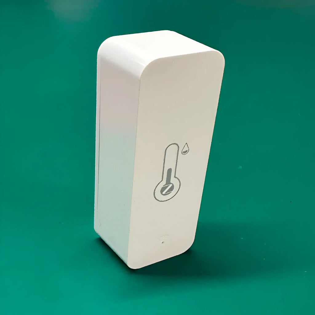 Compact white WiFi and Zigbee temperature and humidity sensor for smart home monitoring