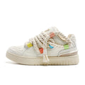 Creamy white retro skateboard shoes with old damage lace detailing and platform rubber sole