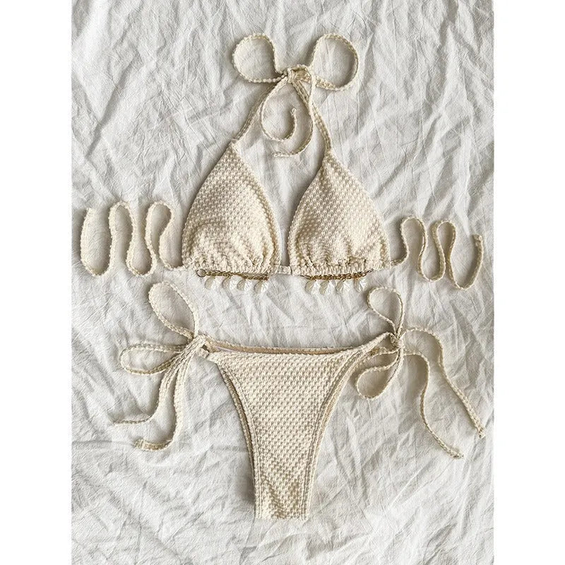 Women's halter neck lace-up bikini swimsuit in polyester fabric available in milky white, green, and white colours