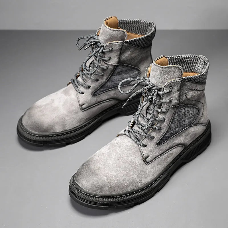 Men's ankle-high Martin boots in frosted grey microfibre leather with a thick rubber sole.