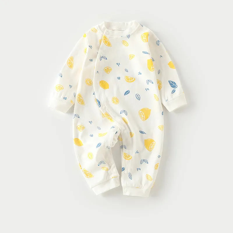 Cotton baby pajamas in cartoon dragon print for a newborn infant.