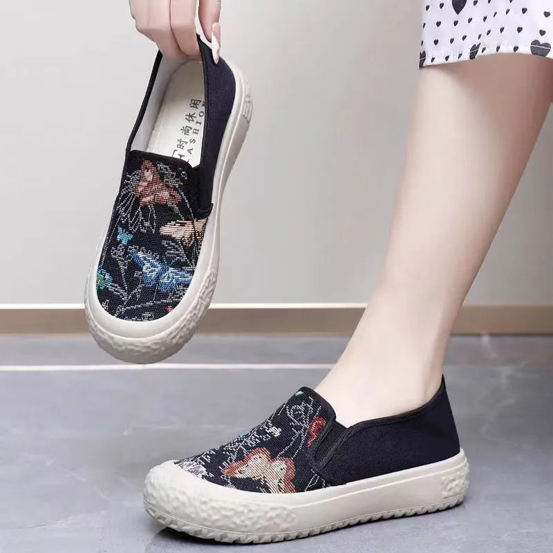 Old Beijing women's canvas slip-on shoes with plastic soles in black and white colours