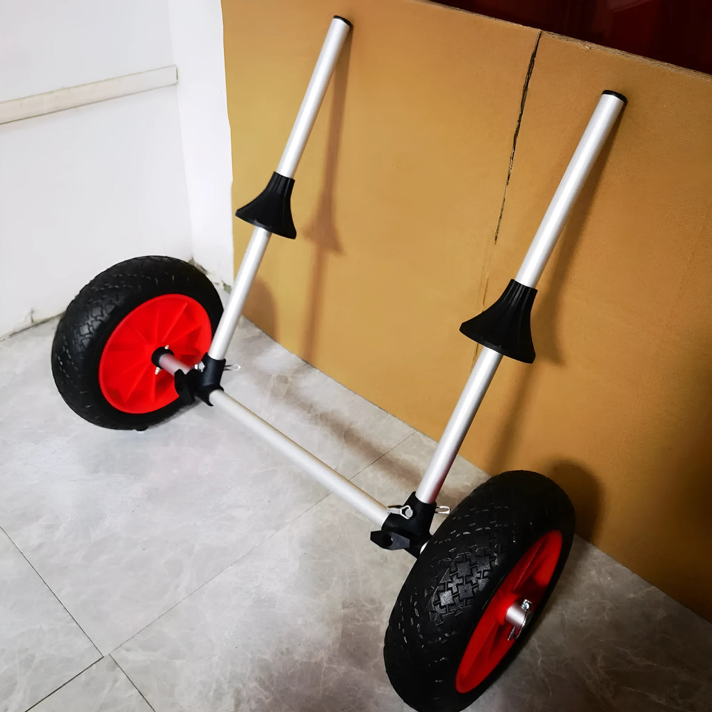 Foldable aluminium kayak beach cart with two black rubber wheels and an upright pull handle, shown folded and extended.