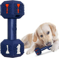 Heavy black rubber dumbbell dog chew toy with textured surface and hollow ends on a white background.
