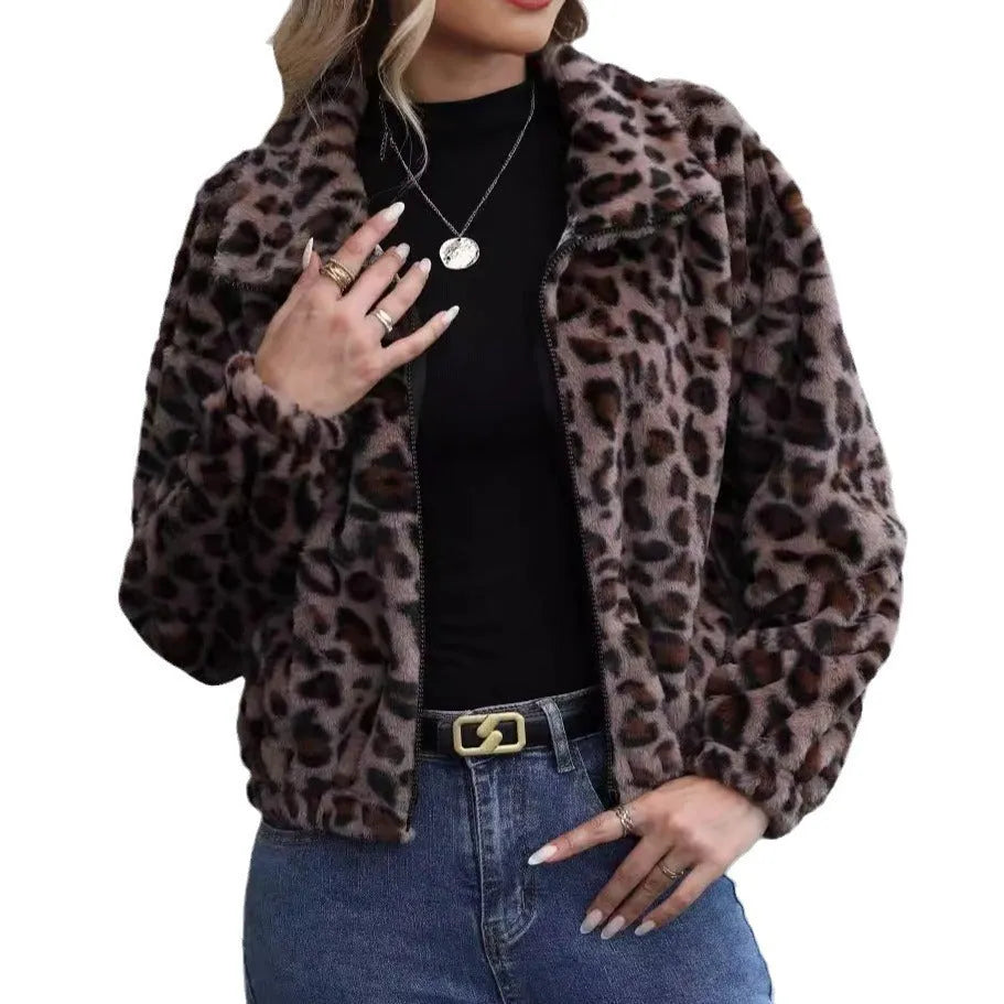 Women's loose long sleeve leopard print zip coat with raglan sleeves on a hanger.