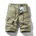 Men's army green cotton shorts with zipper fly and multiple pockets, showing Korean style fit.