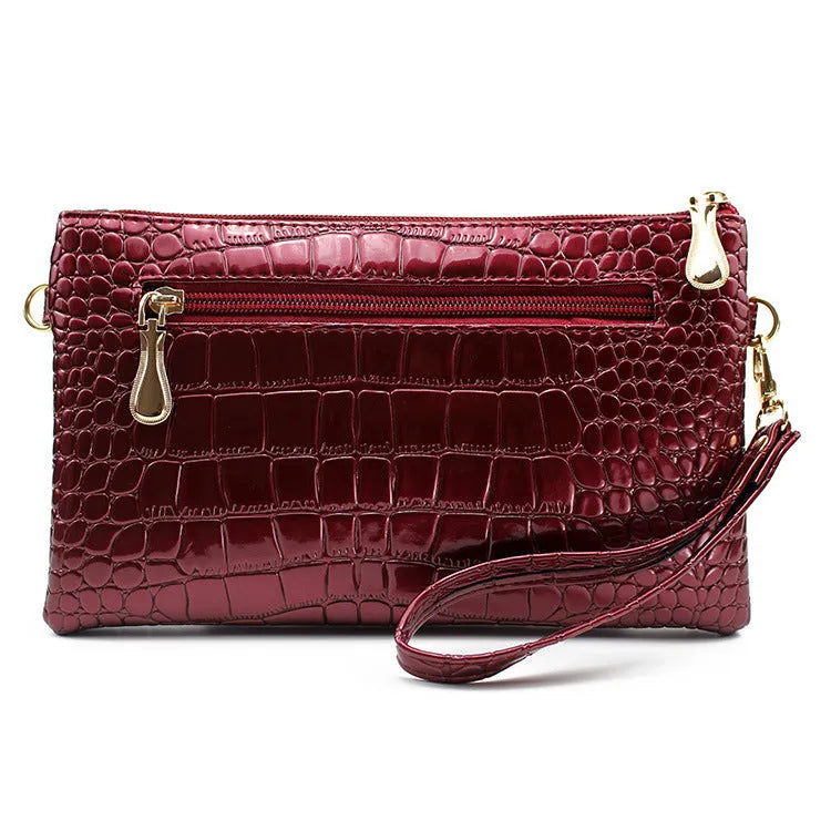 Women's black PU messenger shoulder bag with horizontal square shape showing 24cm width