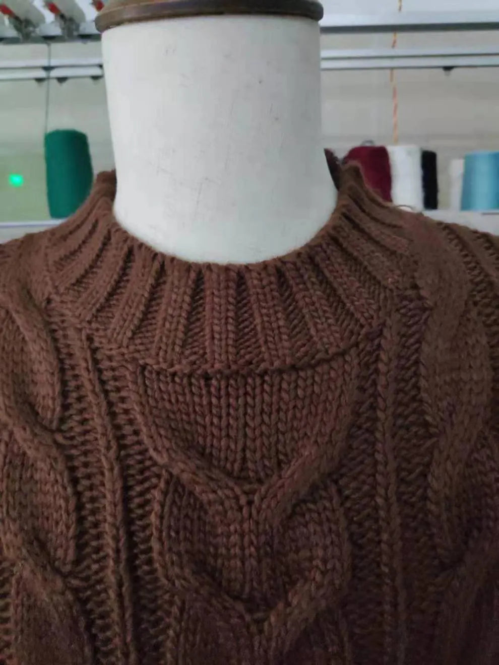 Fashion Men's Long-sleeved Padded Pullover Sweater with twisted flower knit, round neck, in dark green colour.