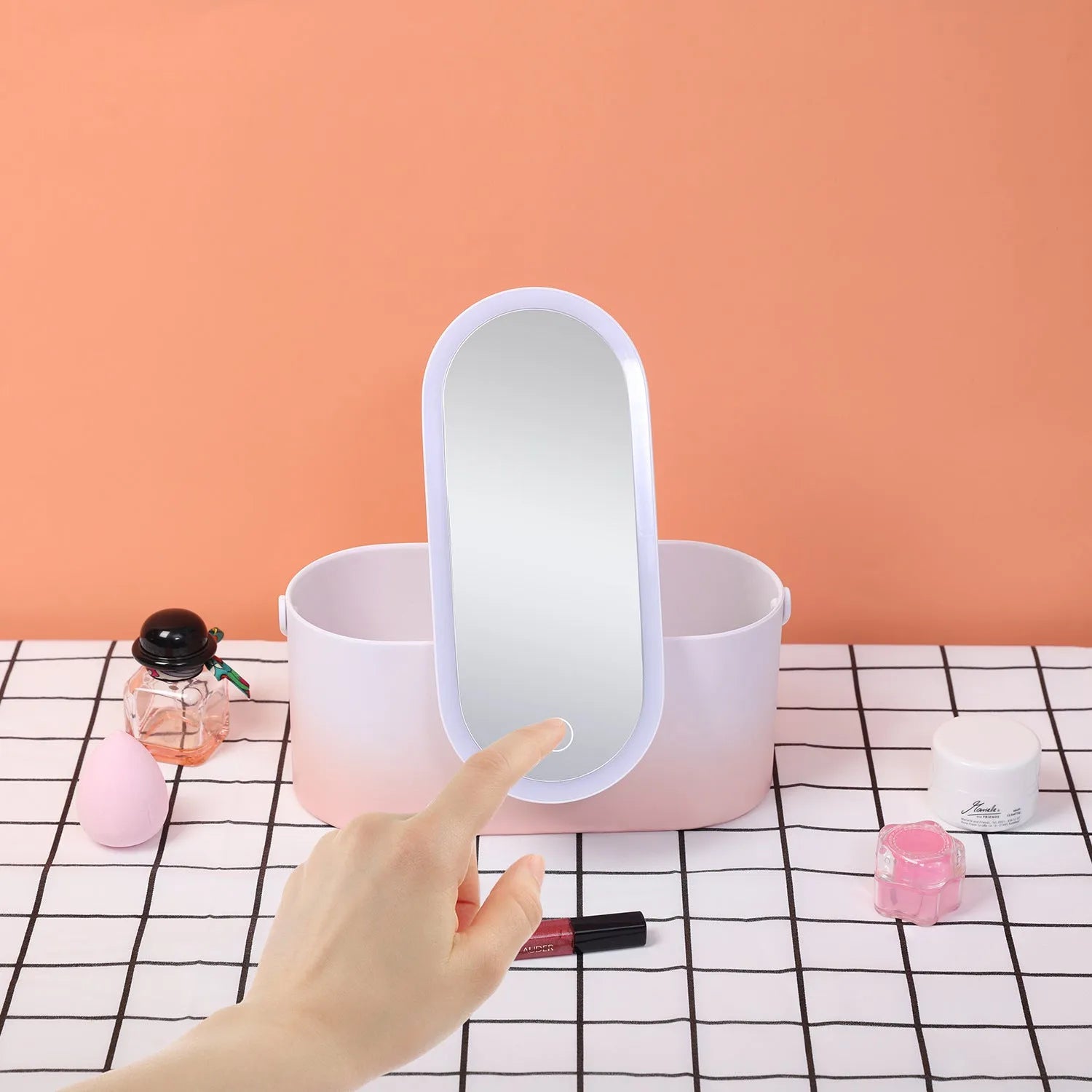 Pink gradient portable LED makeup mirror and organiser storage box with USB charging port.