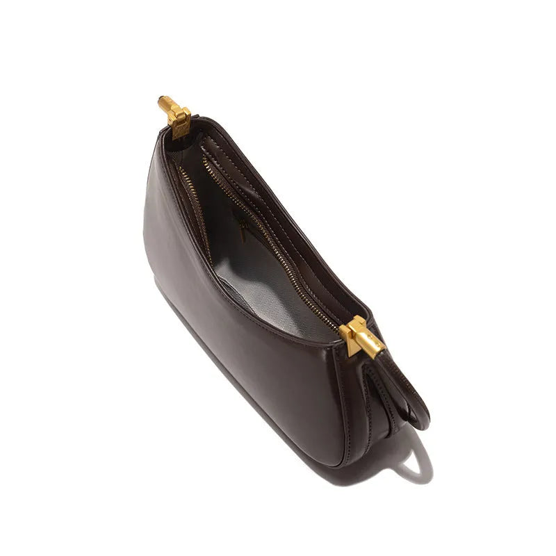 Women's oval PU leather underarm bag in retro style with single shoulder strap