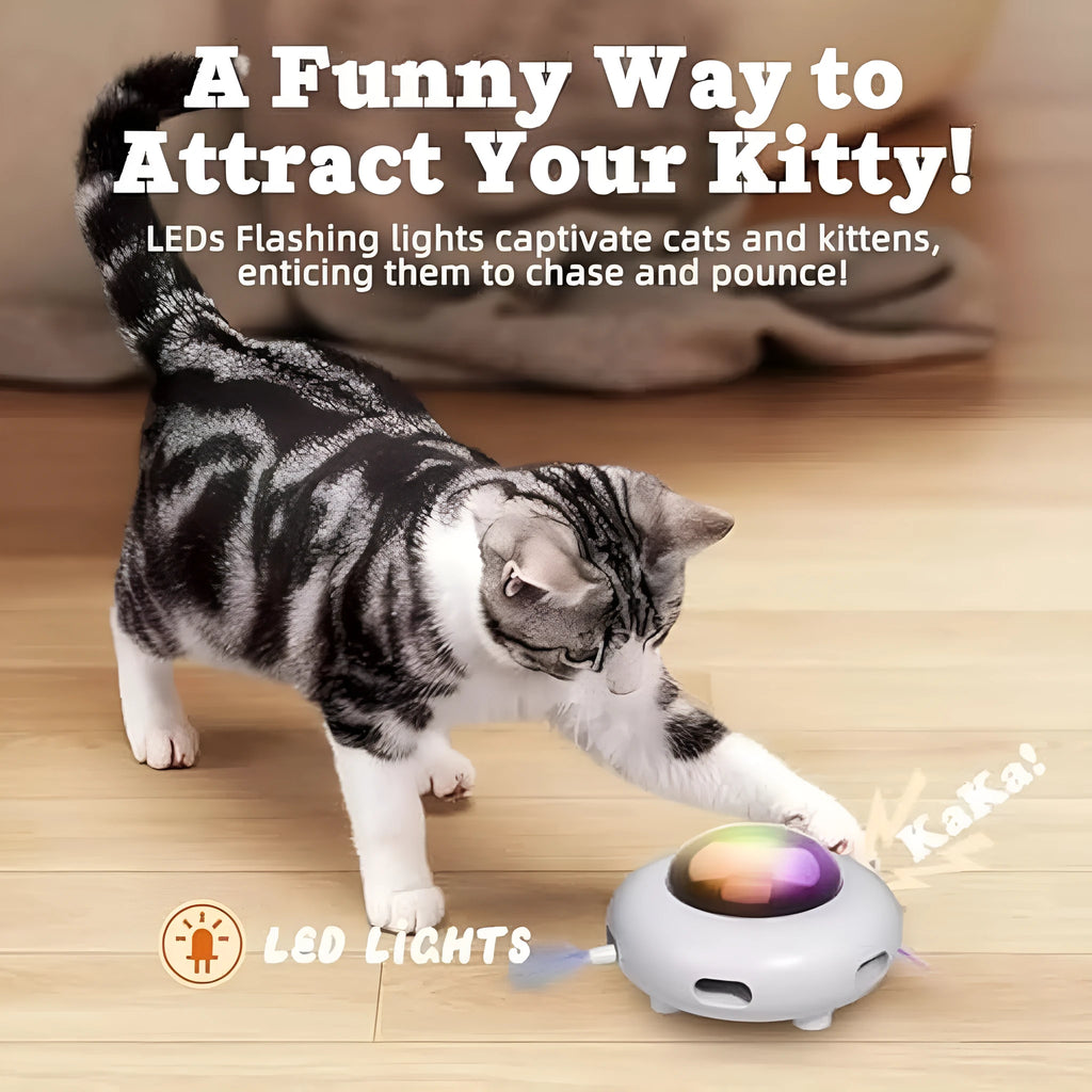 White UFO-shaped interactive cat toy with colourful feathers and LED lights for indoor feline enrichment