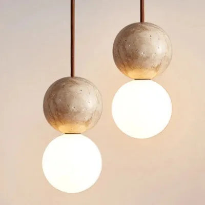 Cream style wabi sabi yellow cave stone pendant light with iron body and marble shade hanging from ceiling