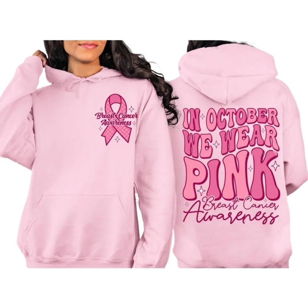 Women's pink pullover hoodie with a retro Breast Cancer Awareness print and side seam pockets.