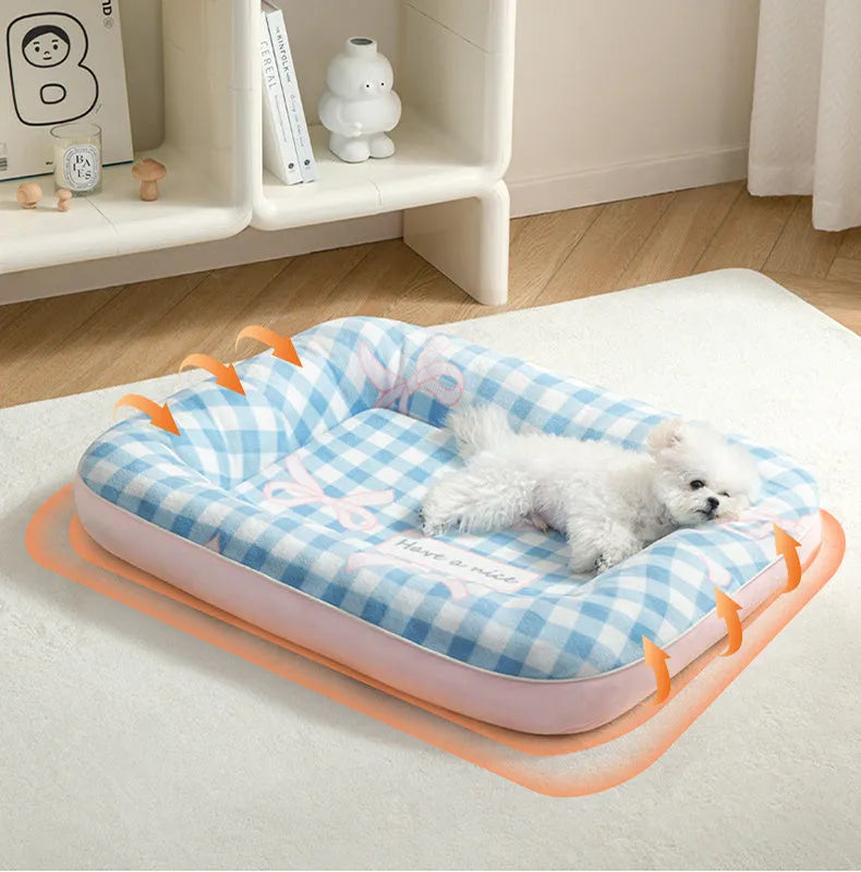 Blue small dog bed cushion with PP cotton fill, size M, on a sofa