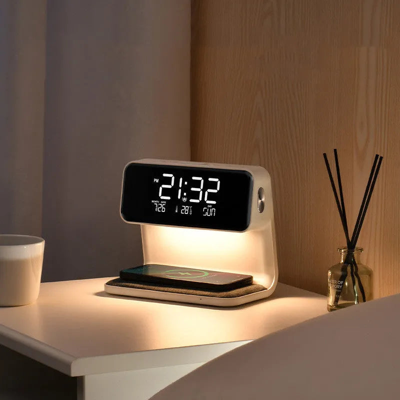 White 3-in-1 bedside lamp with wireless charging pad, LCD alarm clock display, and touch controls.