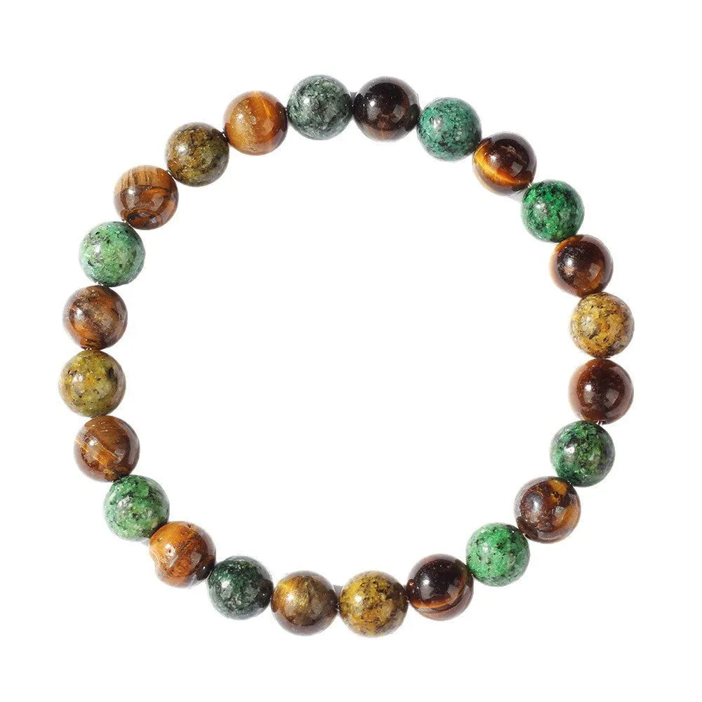 Tigereye natural stone fortune bracelet showing antique floral design and handmade construction