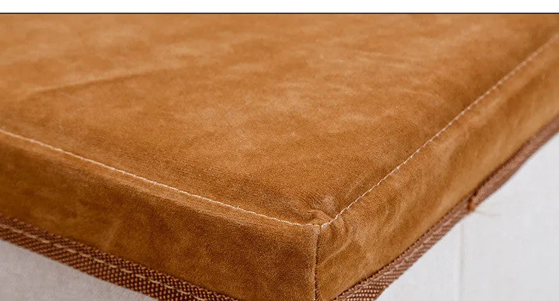 Foldable pet dog stairs in brown flannel and cotton with a cloth storage box on a wooden floor