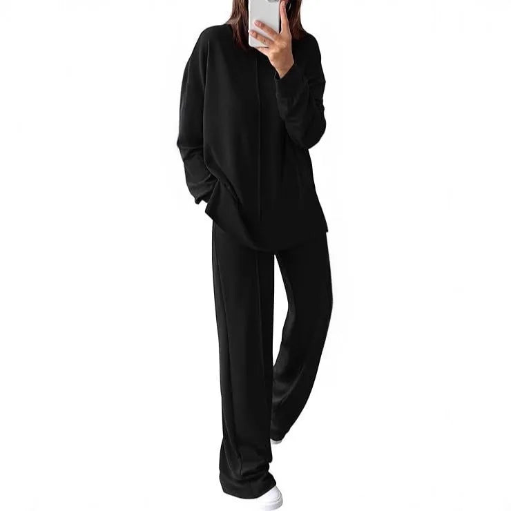 Women's long sleeve polyester jogging suit two-piece set shown in army green.