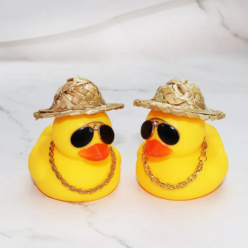 Straw hat yellow duck car dashboard ornament with sunglasses necklace accessory on car interior