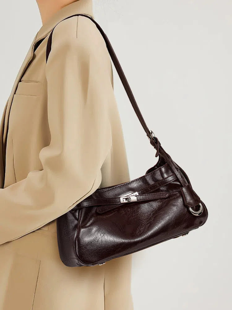 Soft genuine leather horizontal square crossbody bag with stitching detail, available in black, brown, and coffee for daily commuting