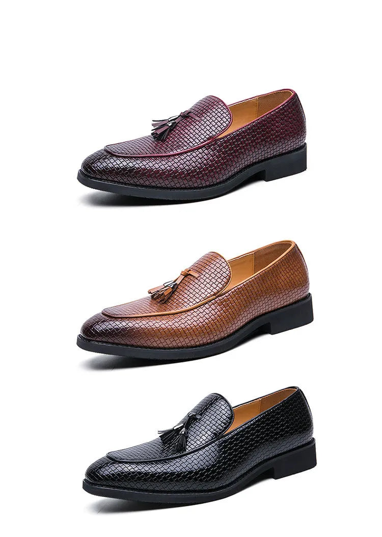 Men's black pointed toe slip-on shoes with a tassel detail on the artificial PU upper.