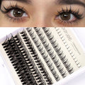 False eyelash glue set with lashes, tweezers, brush, and pink or black adhesive bottle
