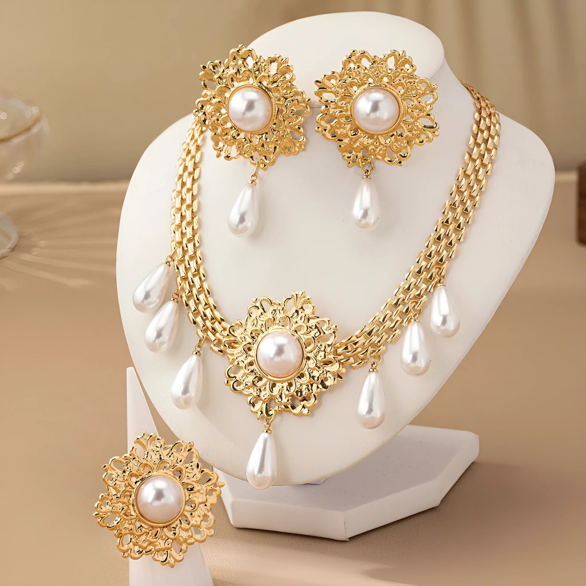 French retro hollow flower pearl tassel jewellery set in white, including necklace, earrings, and ring, alloy material