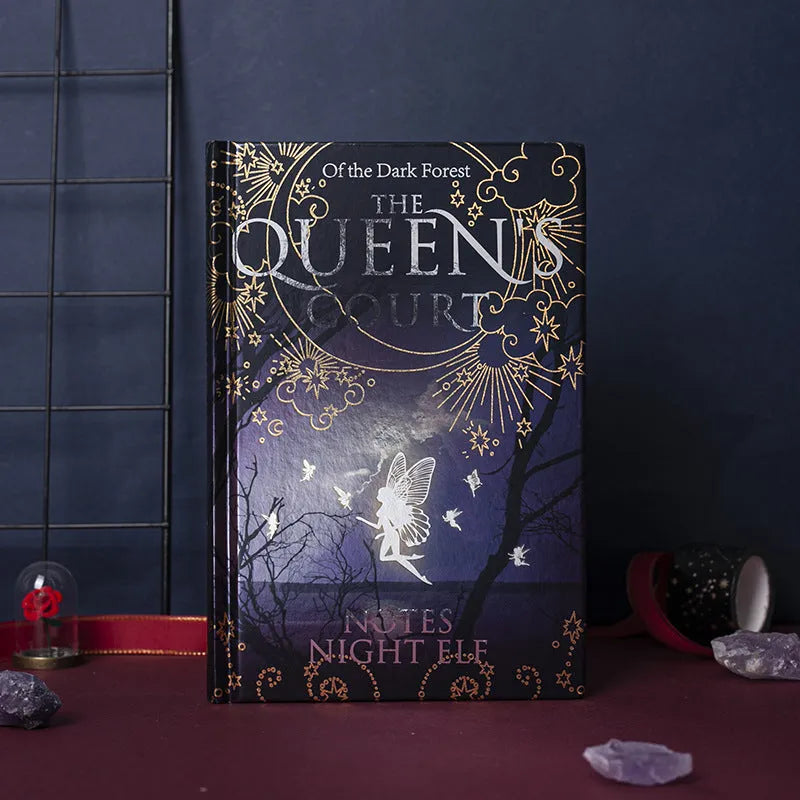 Blue A5 luminous hardcover notebook open to show full-colour illustrated pages.